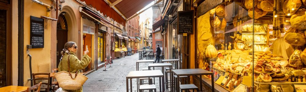 famous-gastronomical-street-with-food-stores-in-bologna-italy.jpg